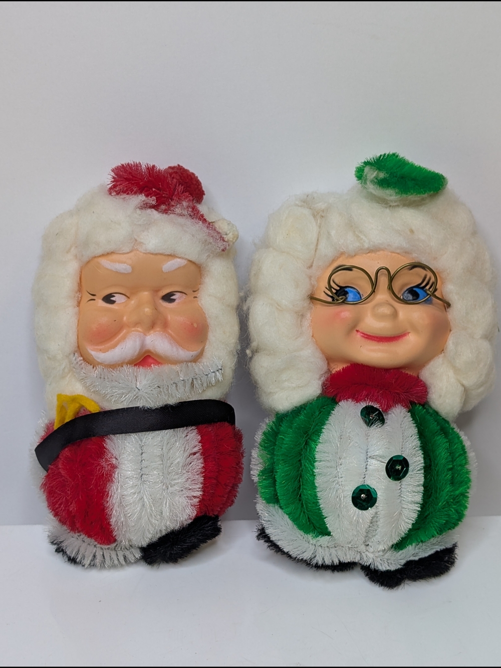 Vintage Handmade Santa And Mrs. Claus Plastic Face Magnetic Christmas Ornament